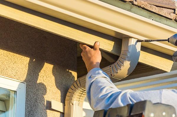 regular gutter cleaning and inspections are crucial for maintaining the effectiveness of your gutter installation